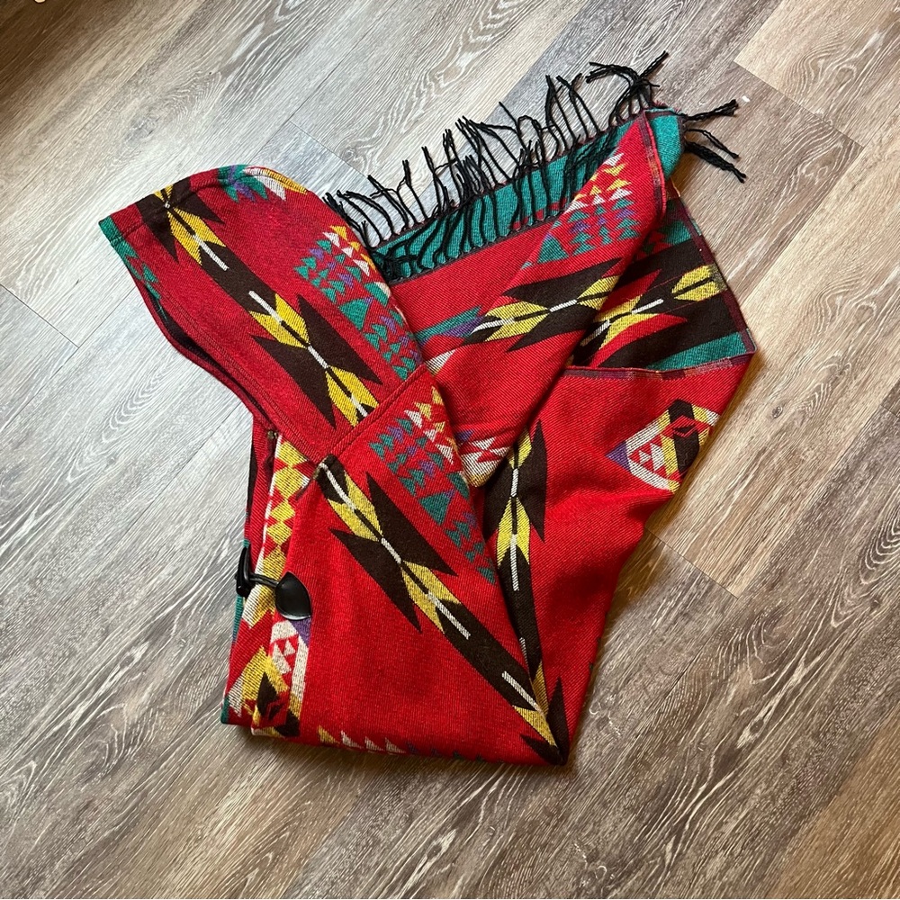 Red Geometric Patterned poncho with hood and Fringe